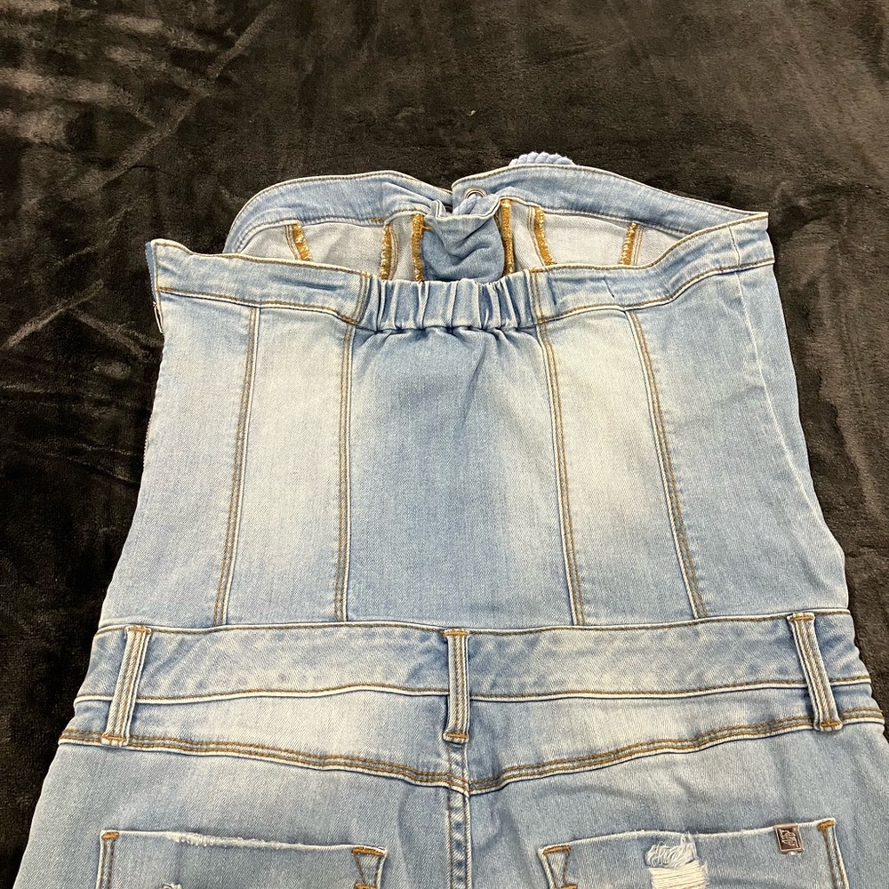 Beautiful Bebe stretch denim jumpsuit . Almost new. Used twice